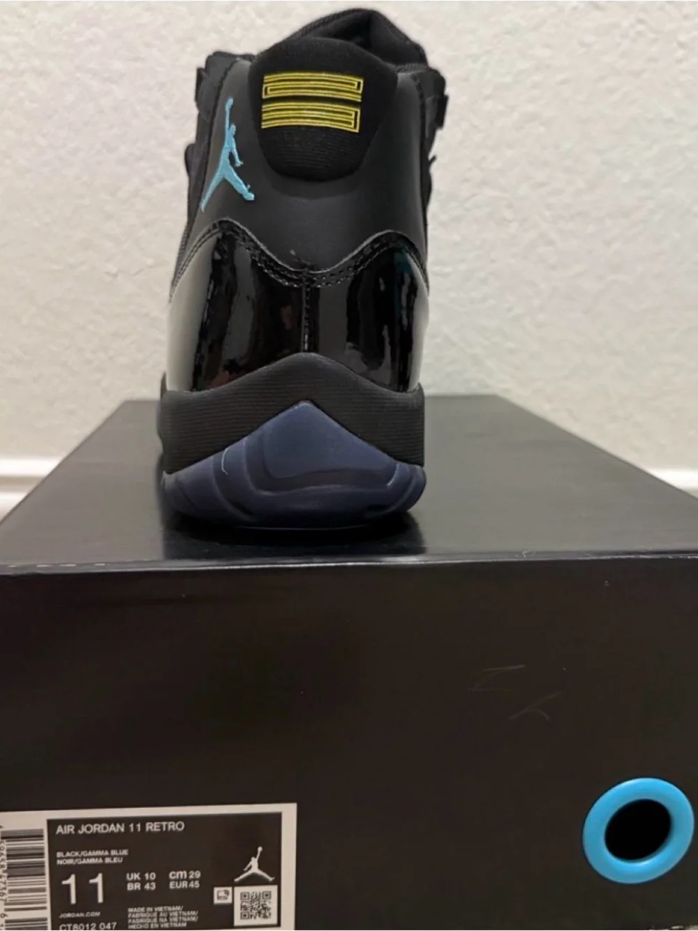 Jordan Men’s Black Sneakers with Blue Jumpman Accent